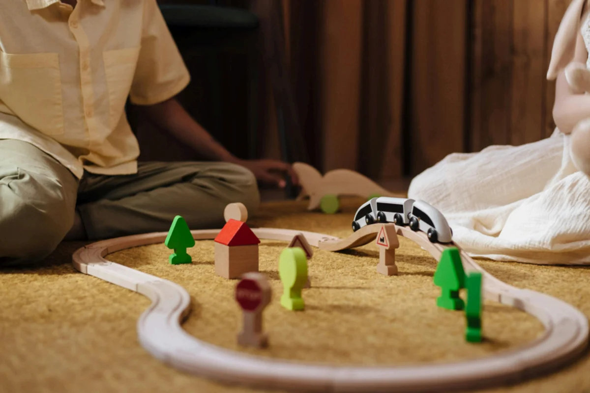 Child blowing bubbles during a play therapy session